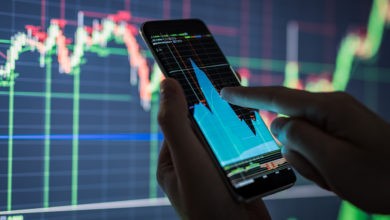 Businessman checking stock market data.